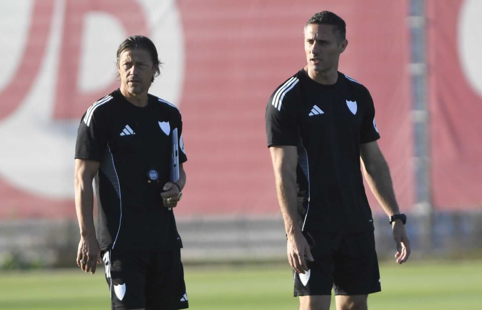 Matías Almeyda y Guido Bonini, en un entrenamiento.