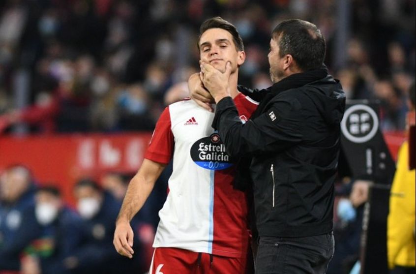  Eduardo Coudet abrazando a Denis.