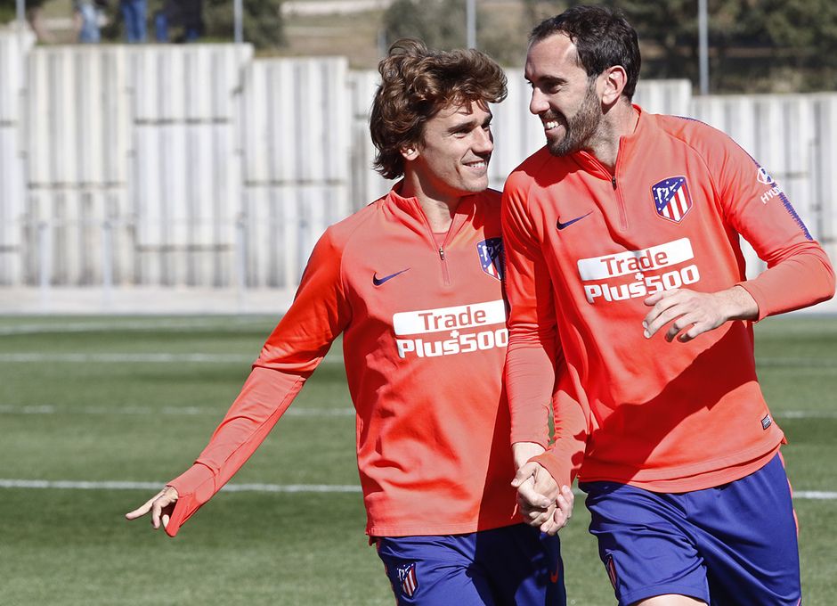  Godín y Griezmann, en la sesión de este viernes.