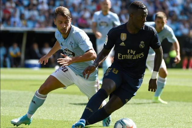 Kevin persiguiendo a Vinicius.