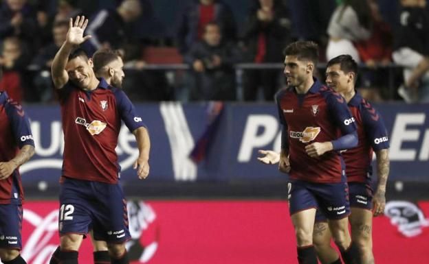  Roncaglia celebra un gol con Nacho Vidal