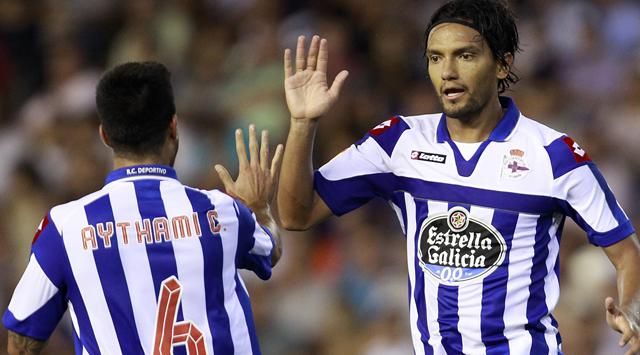 Abel Aguilar y Ahytami Artiles celebran un gol del Dépor.