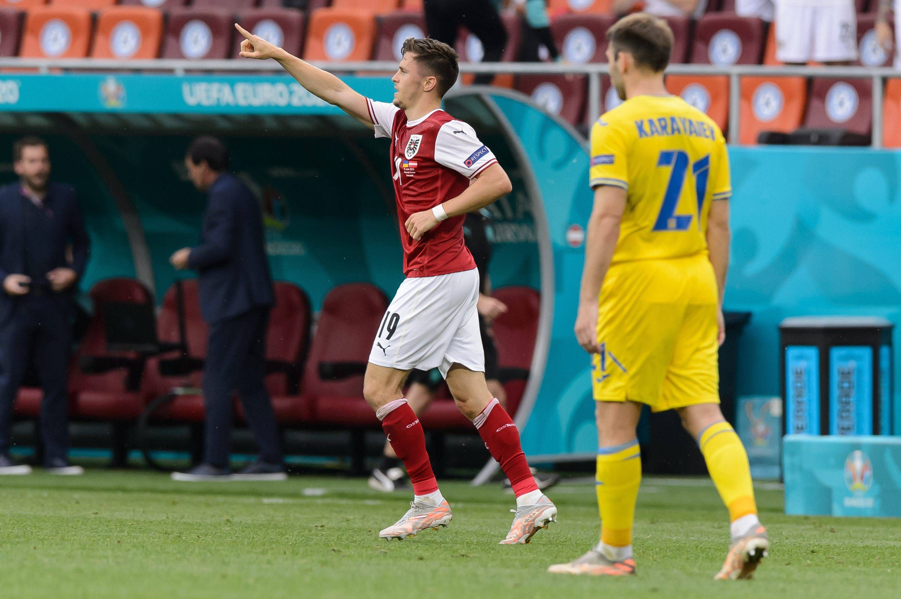  Baumgartner celebra el primer gol de Austria a Ucrania.