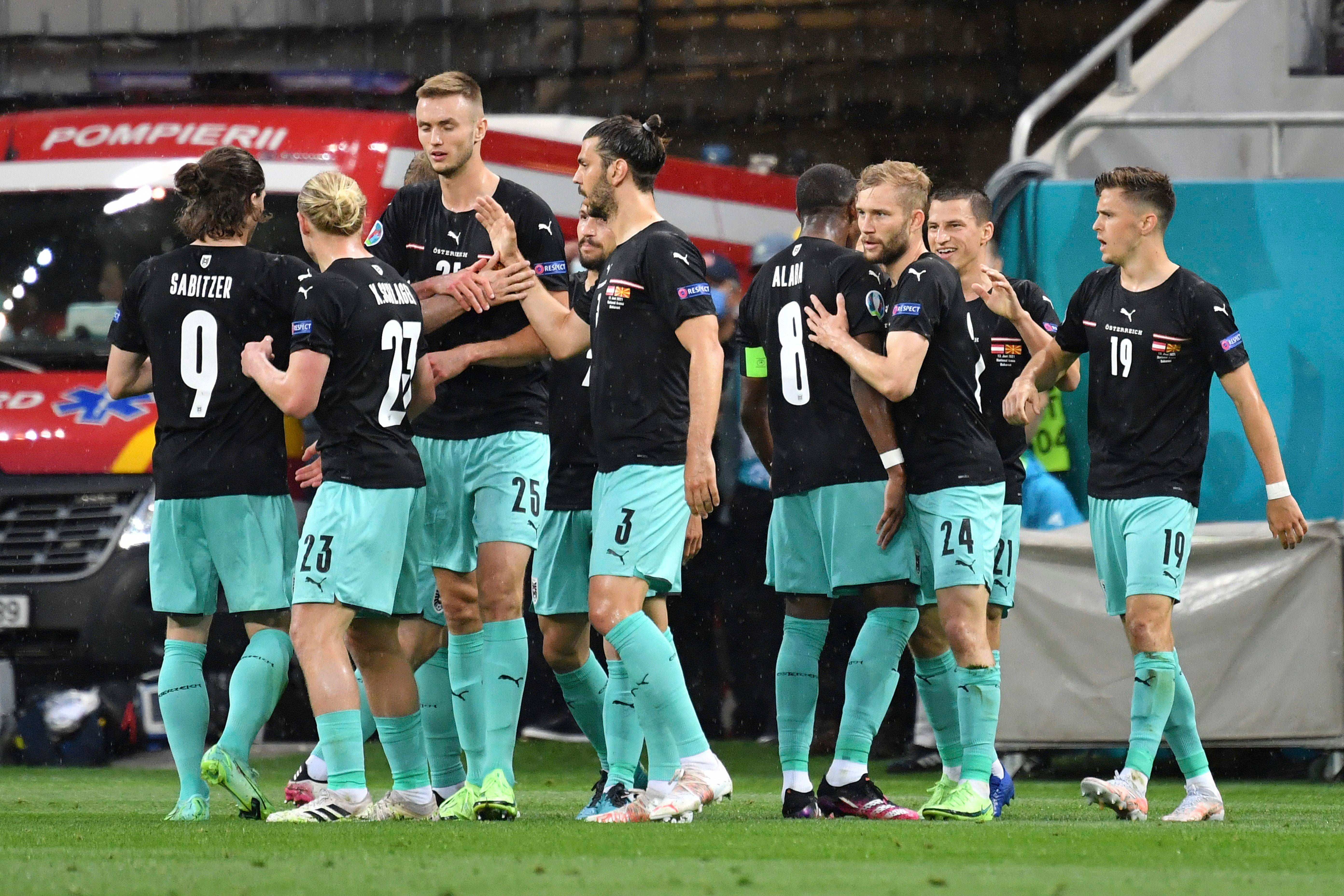  Celebración de Austria tras uno de sus goles a Macedonia.