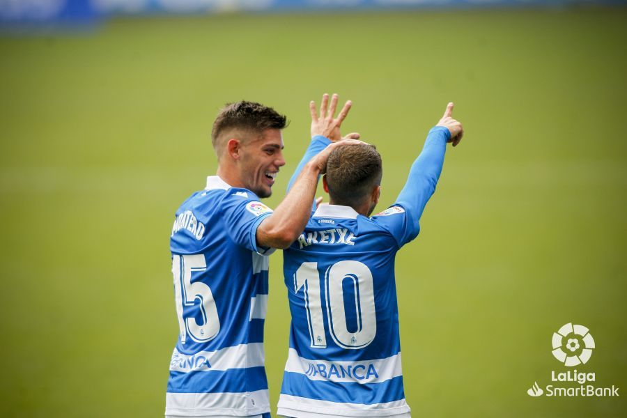 Aketxe celebra con Montero su gol ante el Huesca.