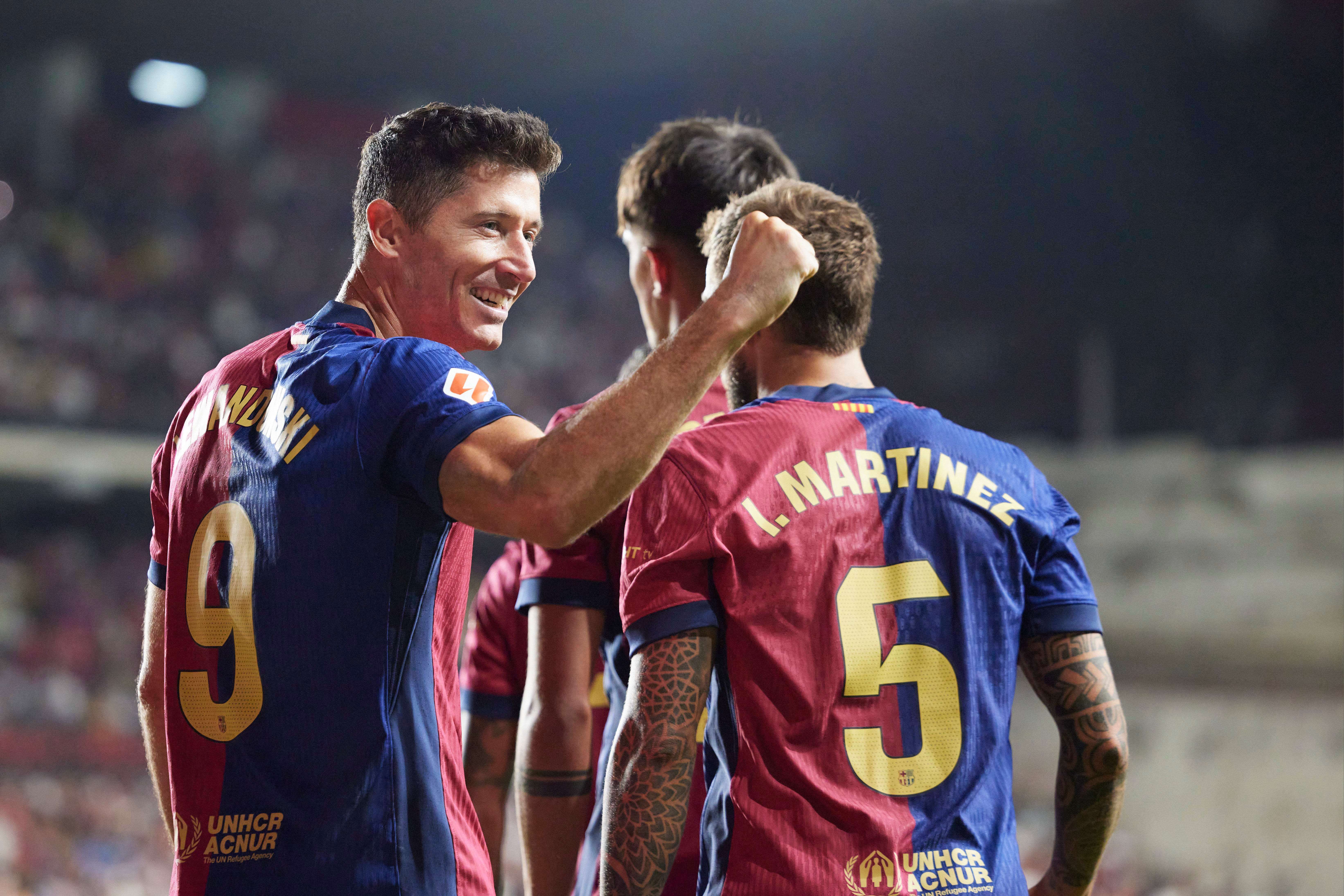  Lewandowski celebra un gol en Vallecas