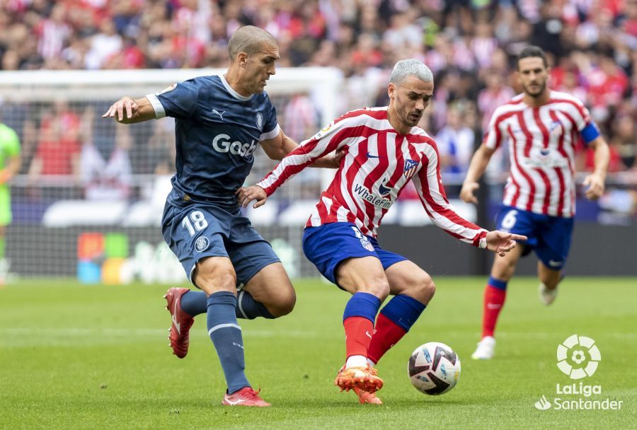  Griezmann, ante Oriol Romeu.