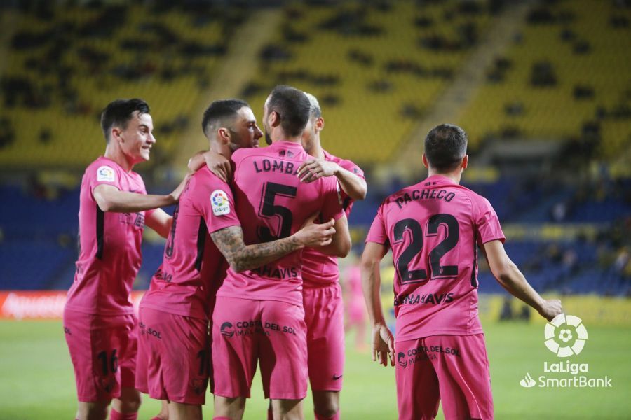 Dani Pacheco, de espaldas, celebrando el tanto de Lombán.