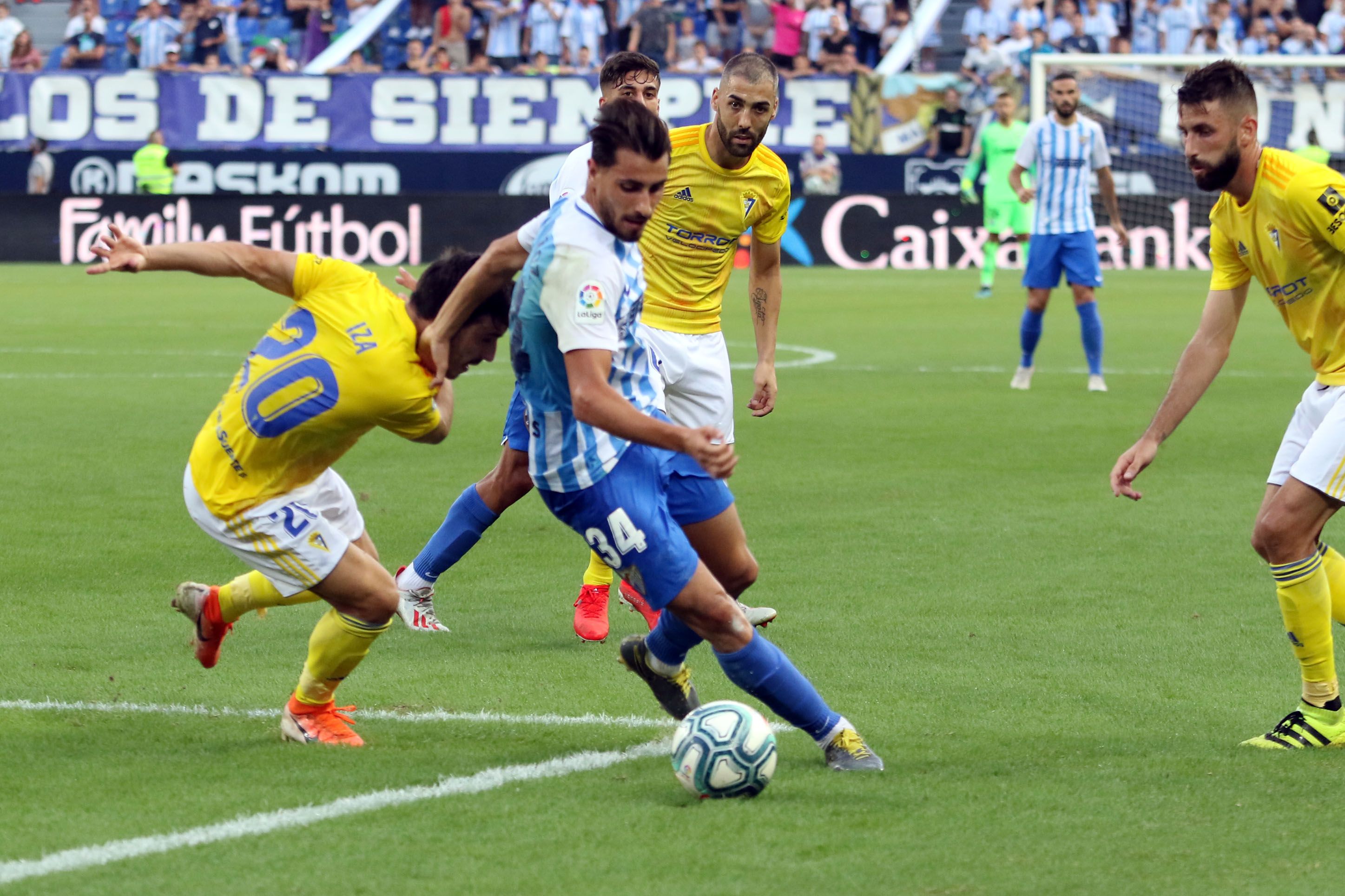 Luis Muñoz, ante el Cádiz en el duelo disputado esta temporada en La Rosaleda.