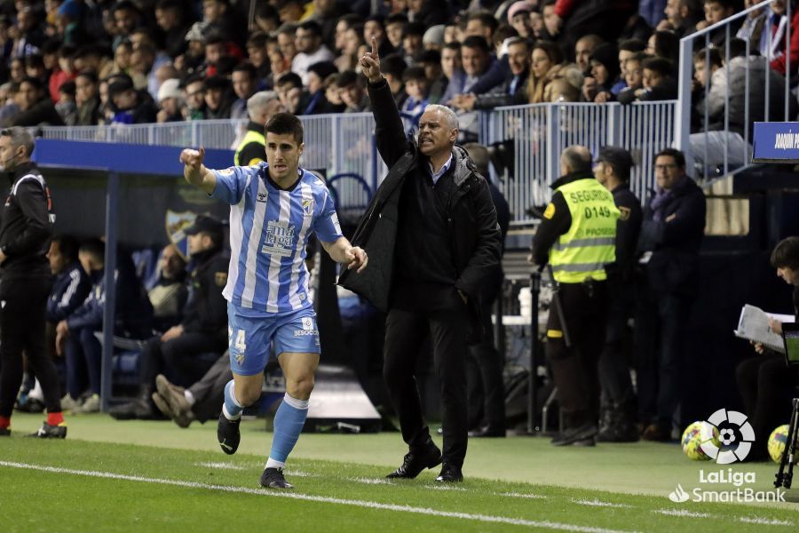  Pellicer y Bustinza, en el Málaga-Oviedo.