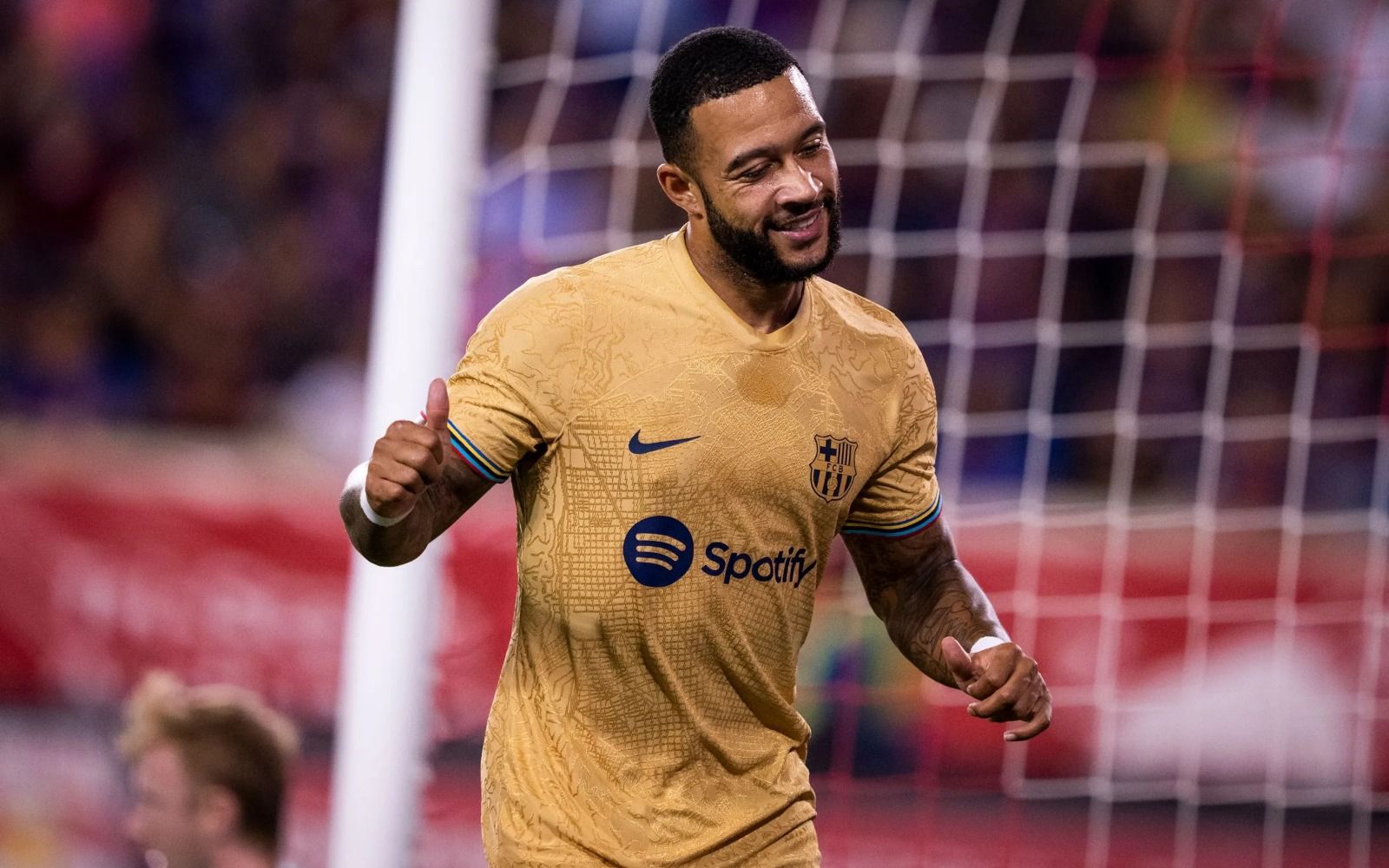 Memphis celebra un gol con el Barça (Foto: FCB).