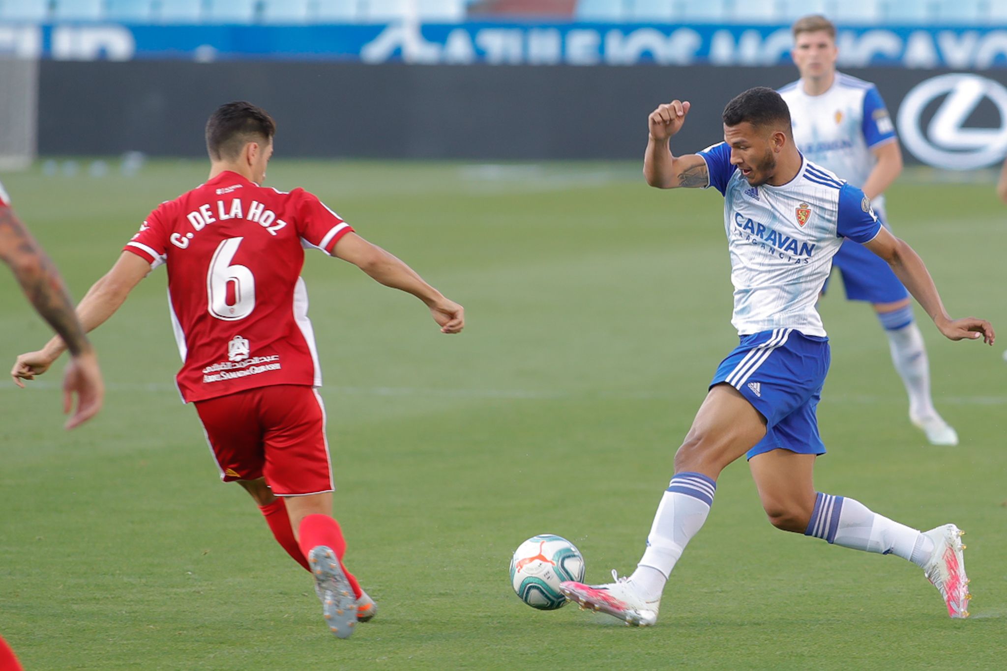  Luis Suárez y César de la Hoz, durante el Zaragoza-Almería.