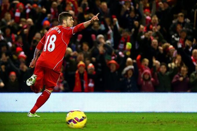 Alberto Moreno, celebrando un gol con el Liverpool.