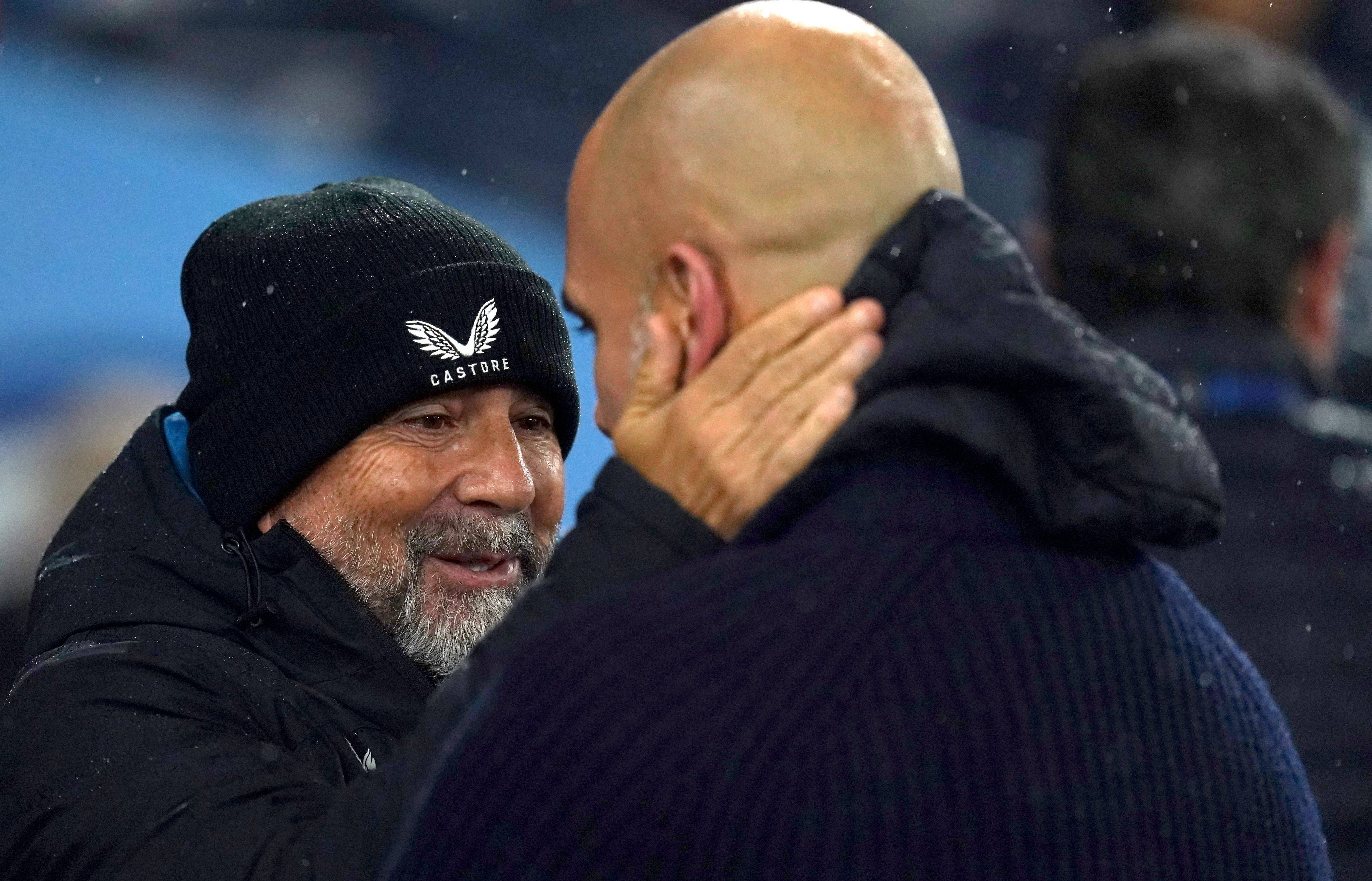  Sampaoli, saludando a Guardiola antes del partido.