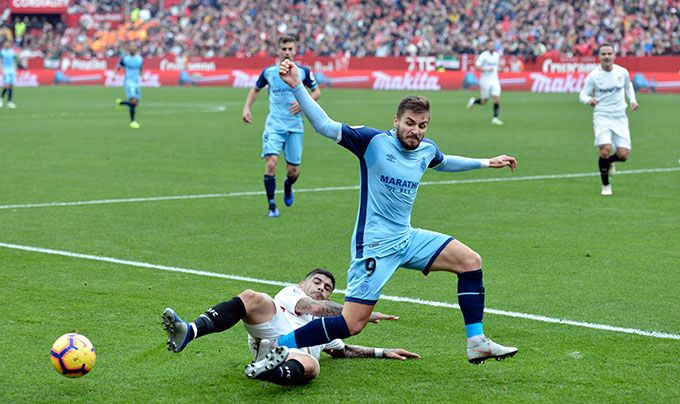  Banega entra a Portu en el Sevilla-Girona.