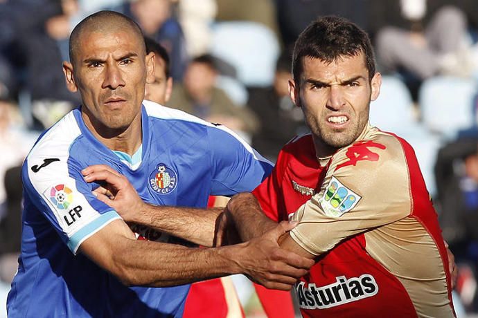  Cata Díaz y David Barral durante un Getafe-Sporting.