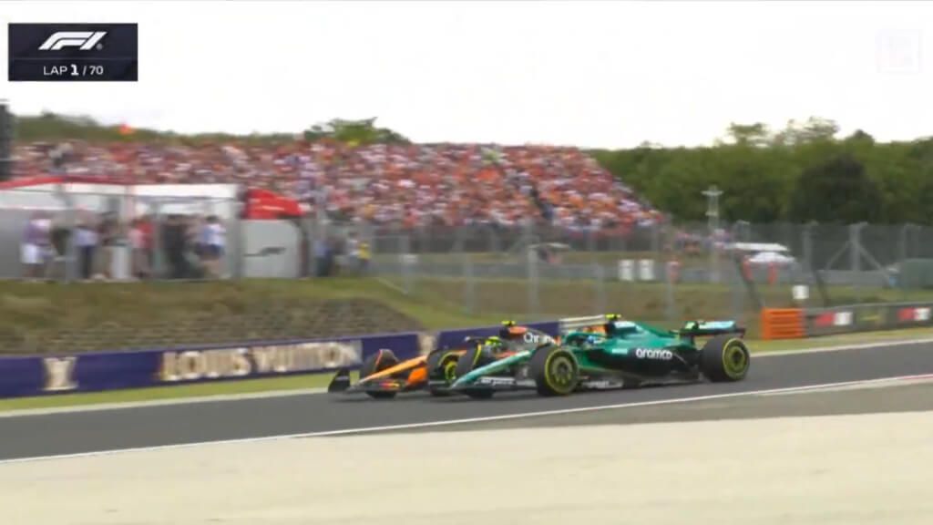 Fernando Alonso y Lando Norris, en Hungría.