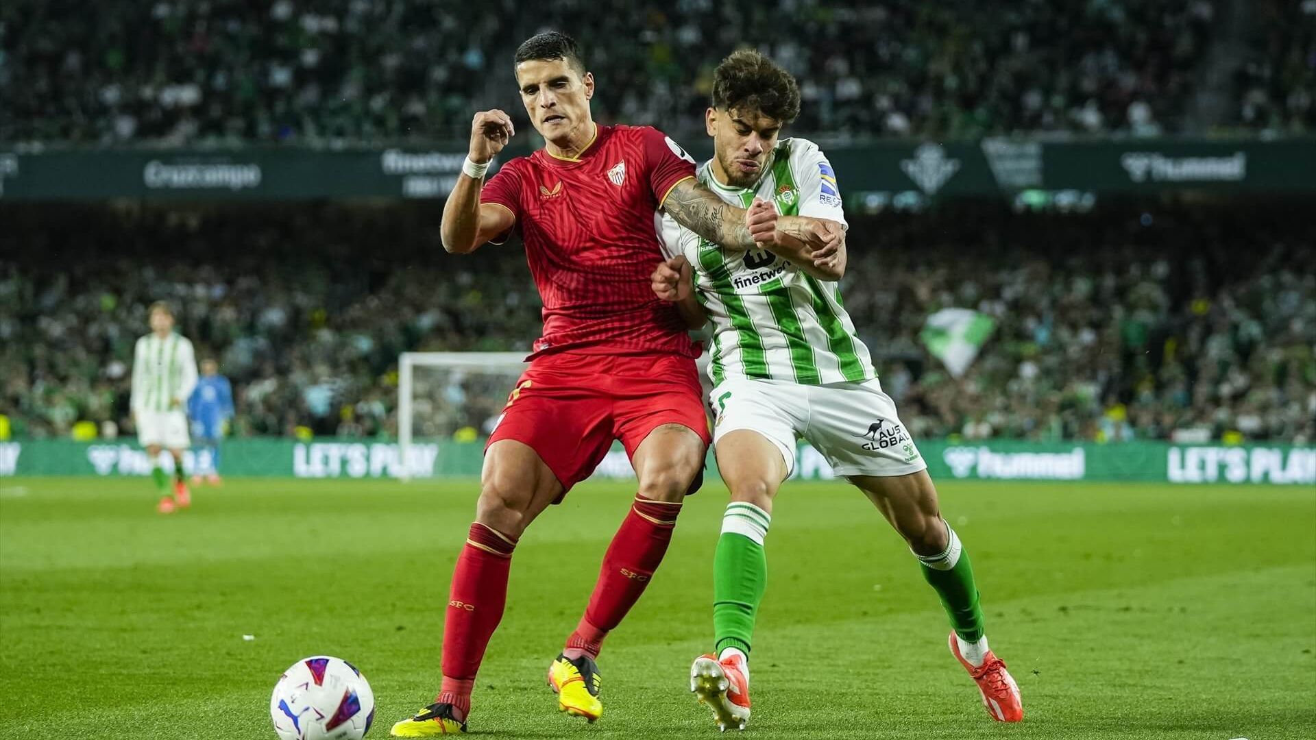europapress_5924296_erik_lamela_of_sevilla_fc_and_ez_abde_of_real_betis_in_action_duri_001.jpg