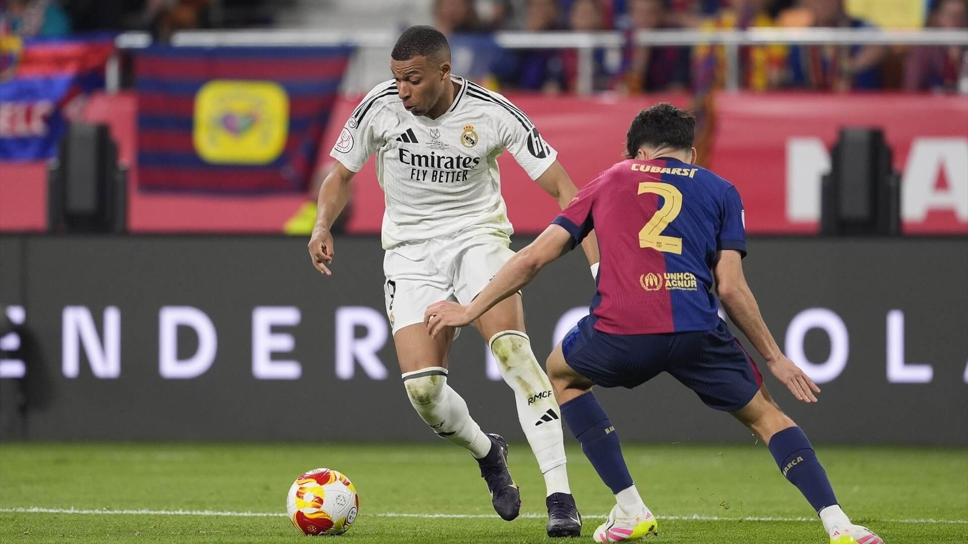 europapress_6679486_kylian_mbappe_of_real_madrid_and_pau_cubarsi_of_fc_barcelona_in_ac.jpg