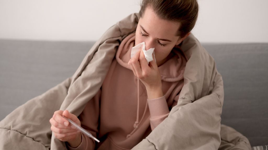  Persona enferma con mocos y fiebre