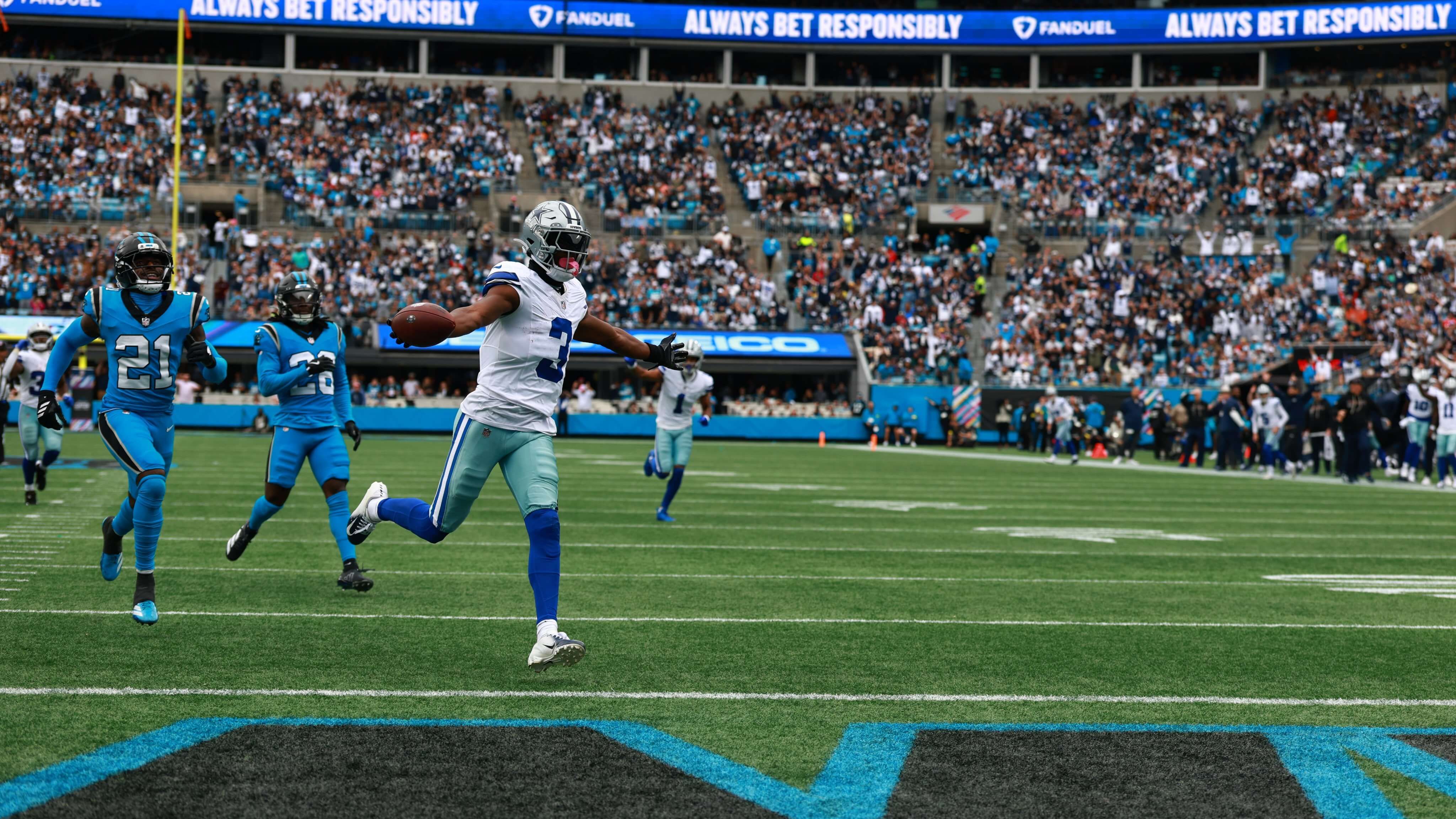  Los Dallas Cowboys ejecutan un touchdown (X)