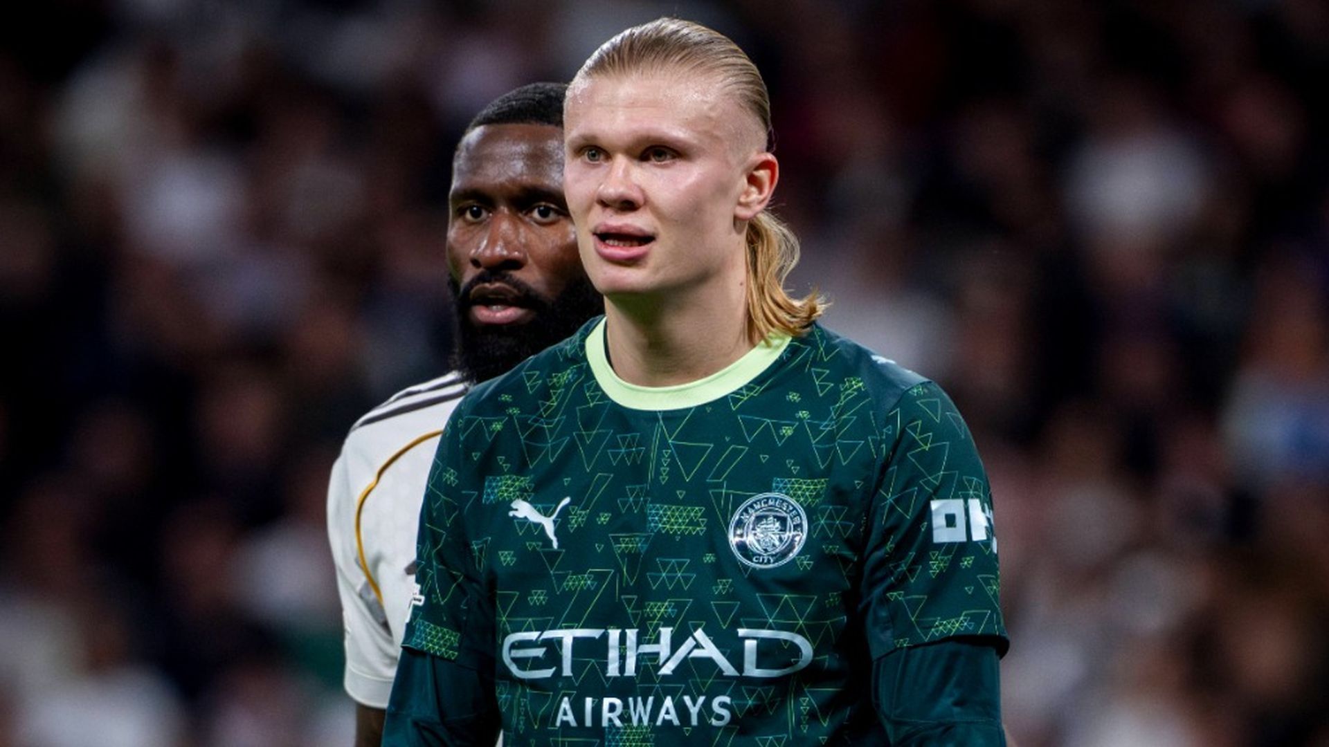 Rüdiger y Haaland en el Real Madrid - Manchester City