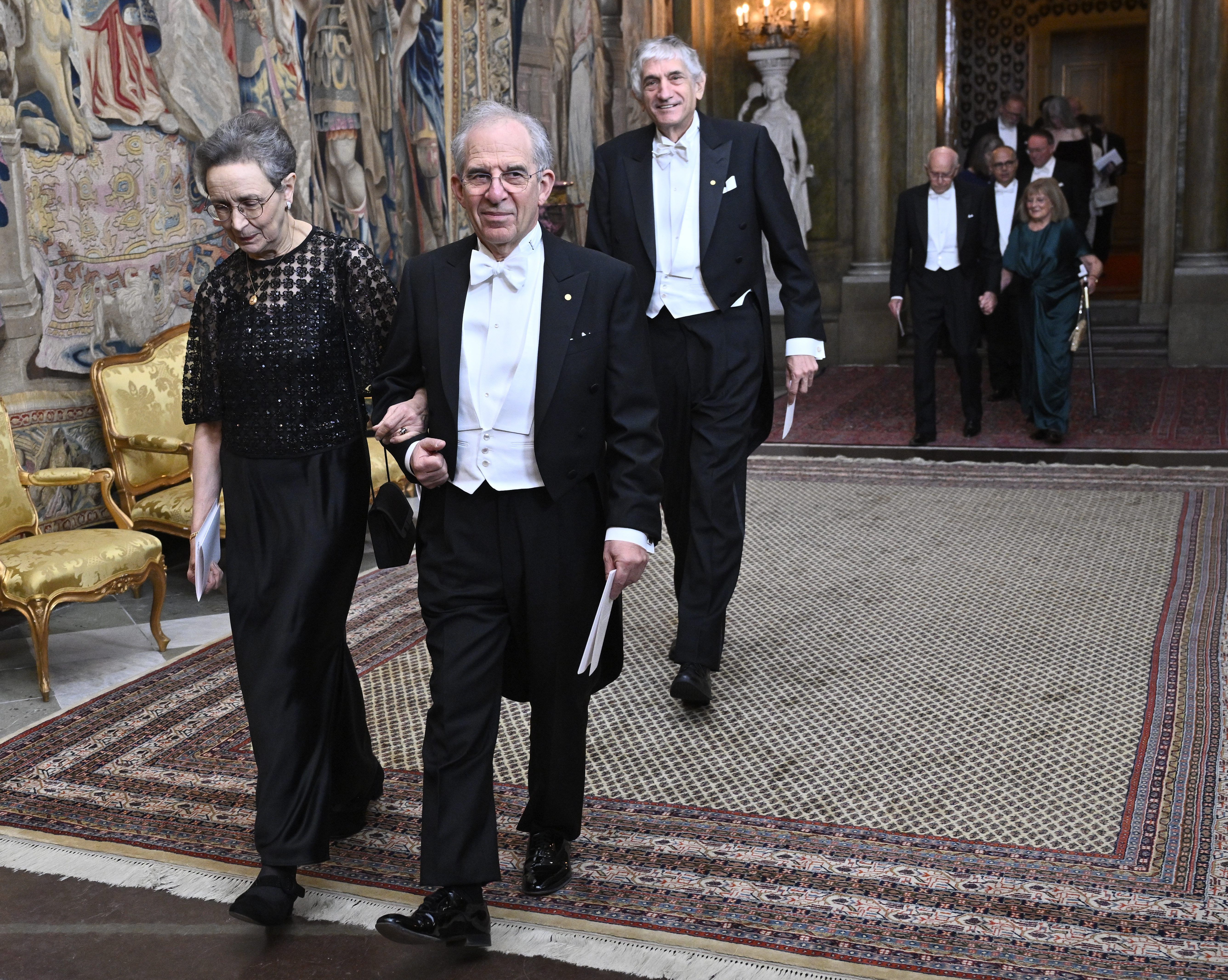 El premio Nobel de Física, Michel H. Devoret junto a Marie-Helene Girard