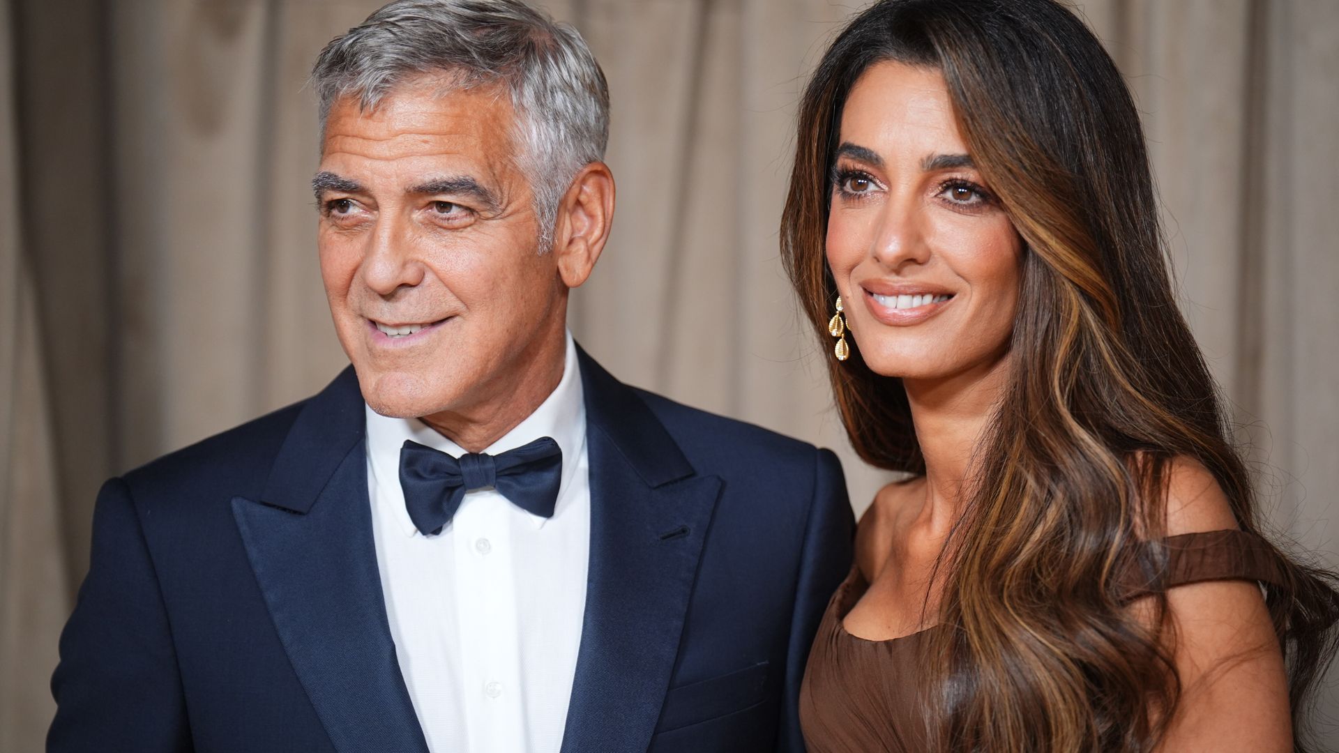 George Clooney y su esposa Alba Clooney George Clooney y su esposa Alba Clooney