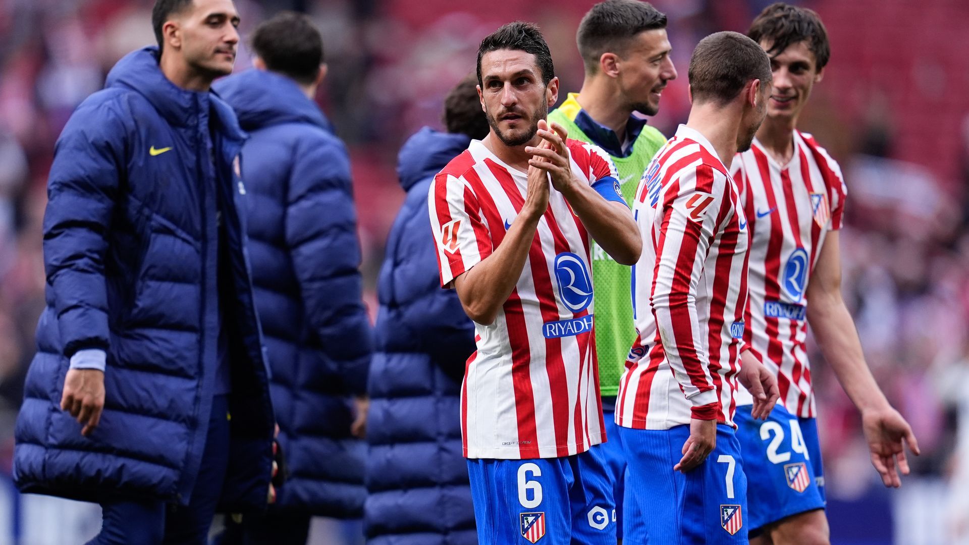 Koke y los jugadores del Atlético de Madrid después de ganar al Valencia
