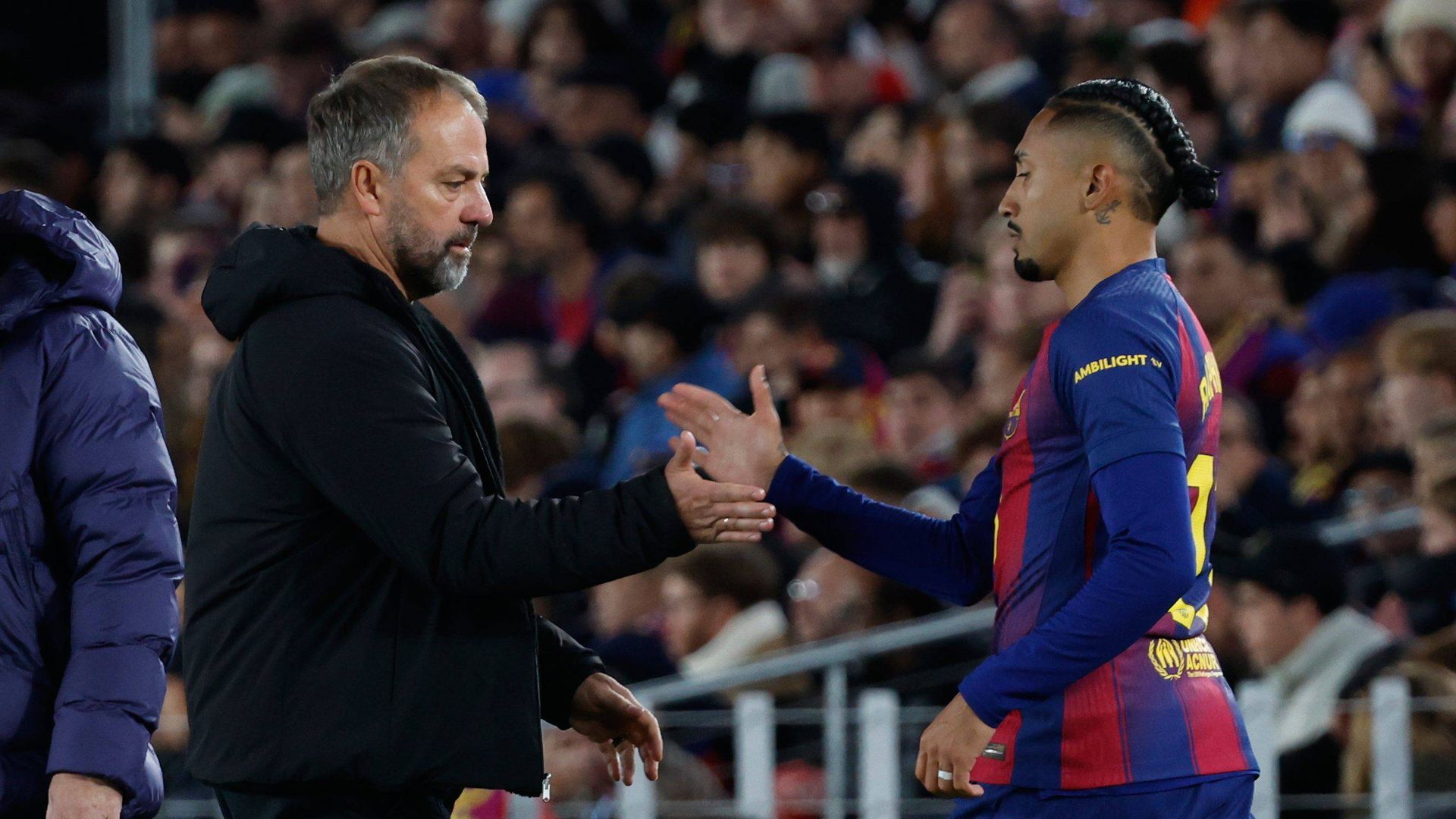 Hansi Flick y Raphinha