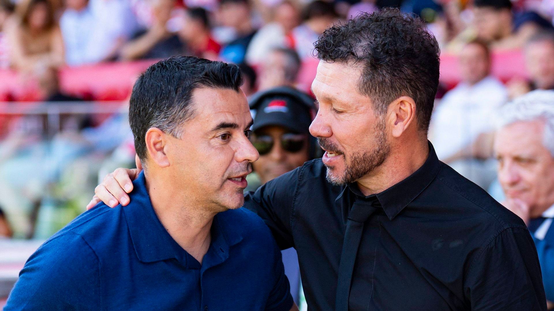 Míchel Sánchez y Diego Pablo Simeone antes de un Girona-Atlético Míchel Sánchez y Diego Pablo Simeone antes de un Girona-Atlético