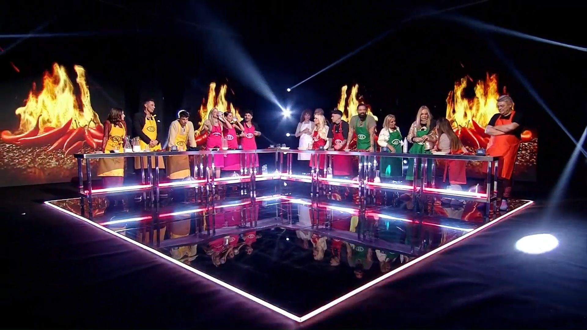 Concursantes ante una buena selección de chiles picantes