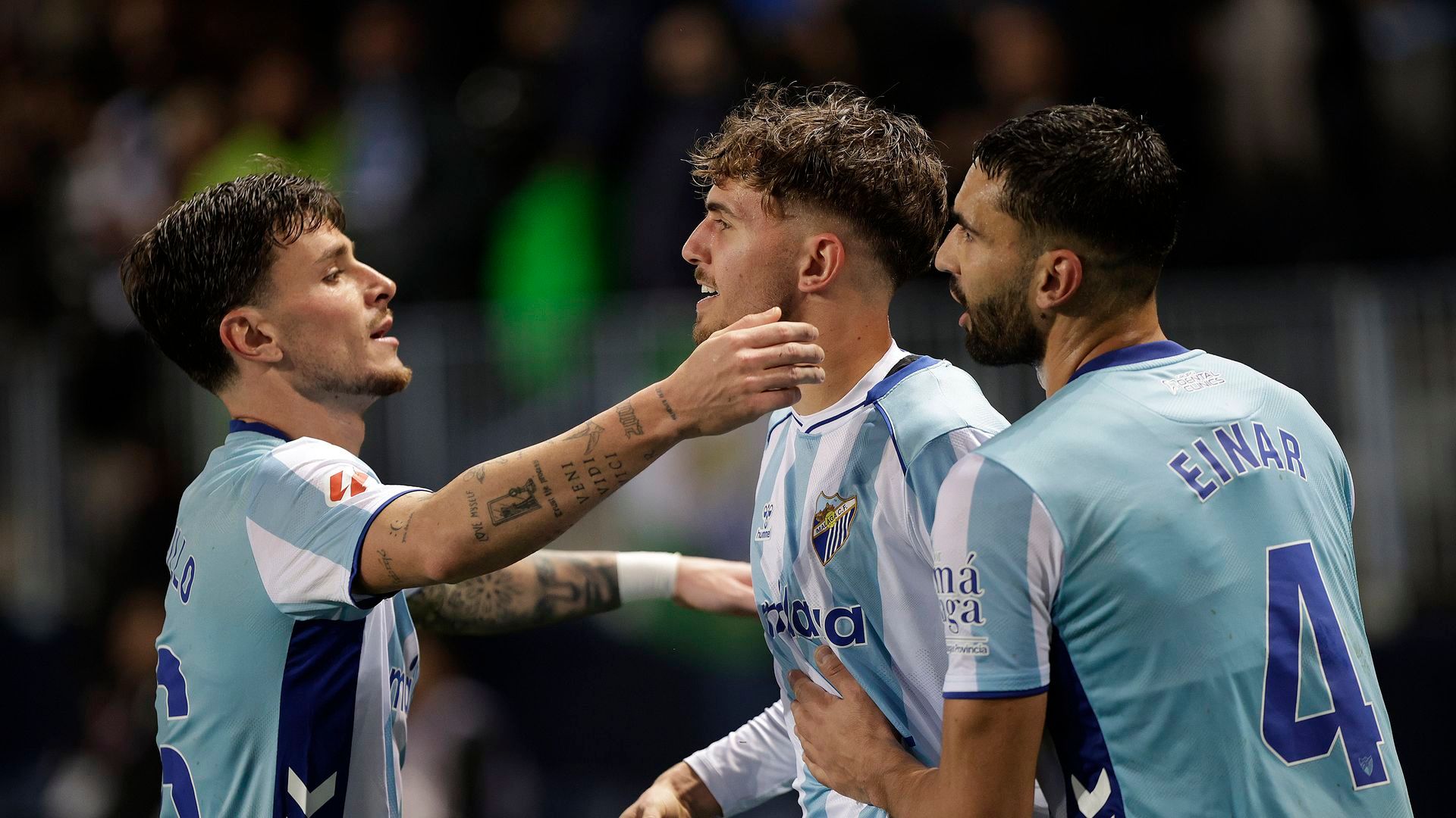 Los jugadores del Málaga celebran un gol ante el Burgos