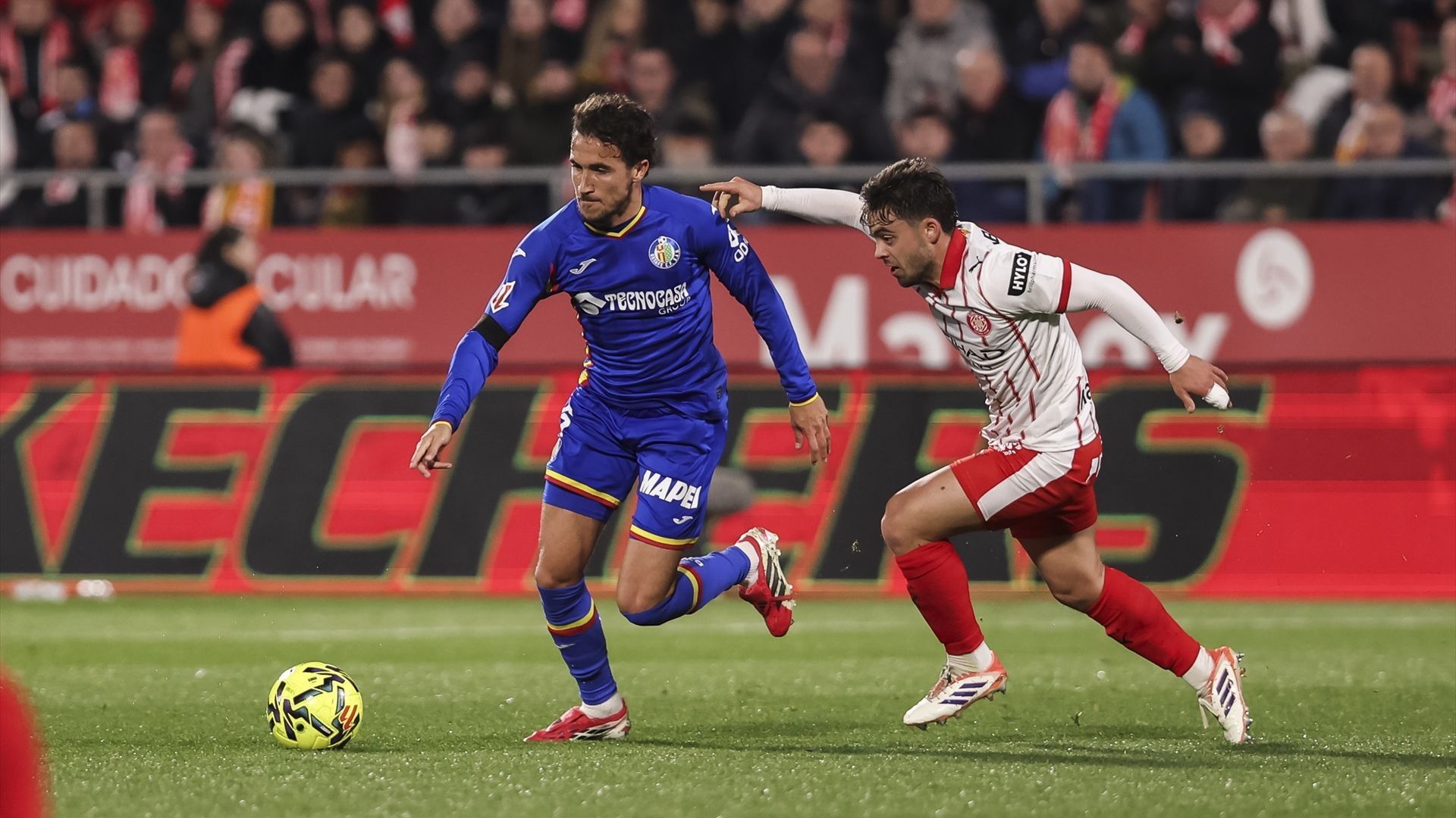 Luis Milla y Fran Beltrán en el Girona - Getafe
