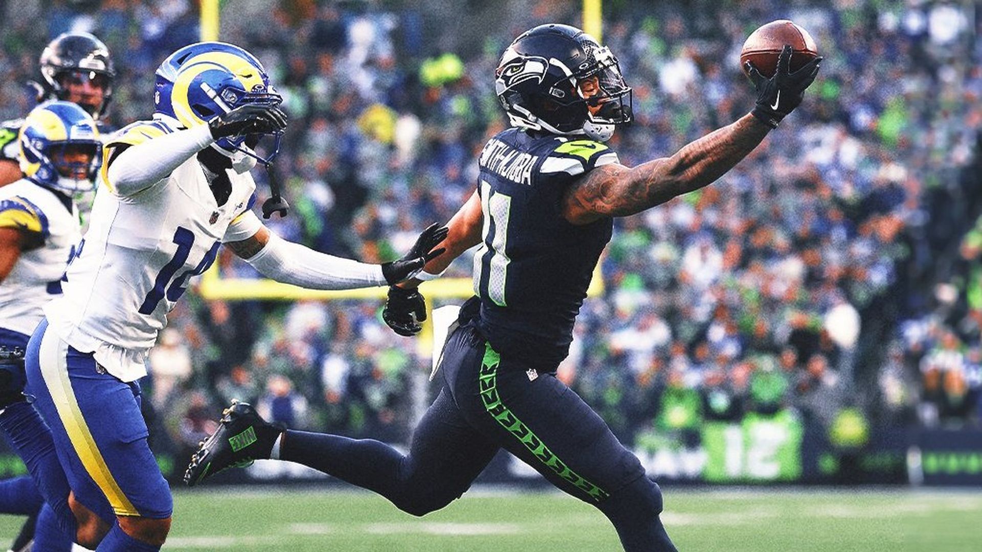 Smith-Njigba en una de las recepciones más espectaculares del partido para los Seahawks.