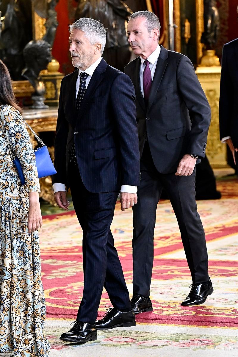 Fernando Grande-Marlaska y su marido, Gorka Alotz, en una recepción en el Palacio Real en 2025