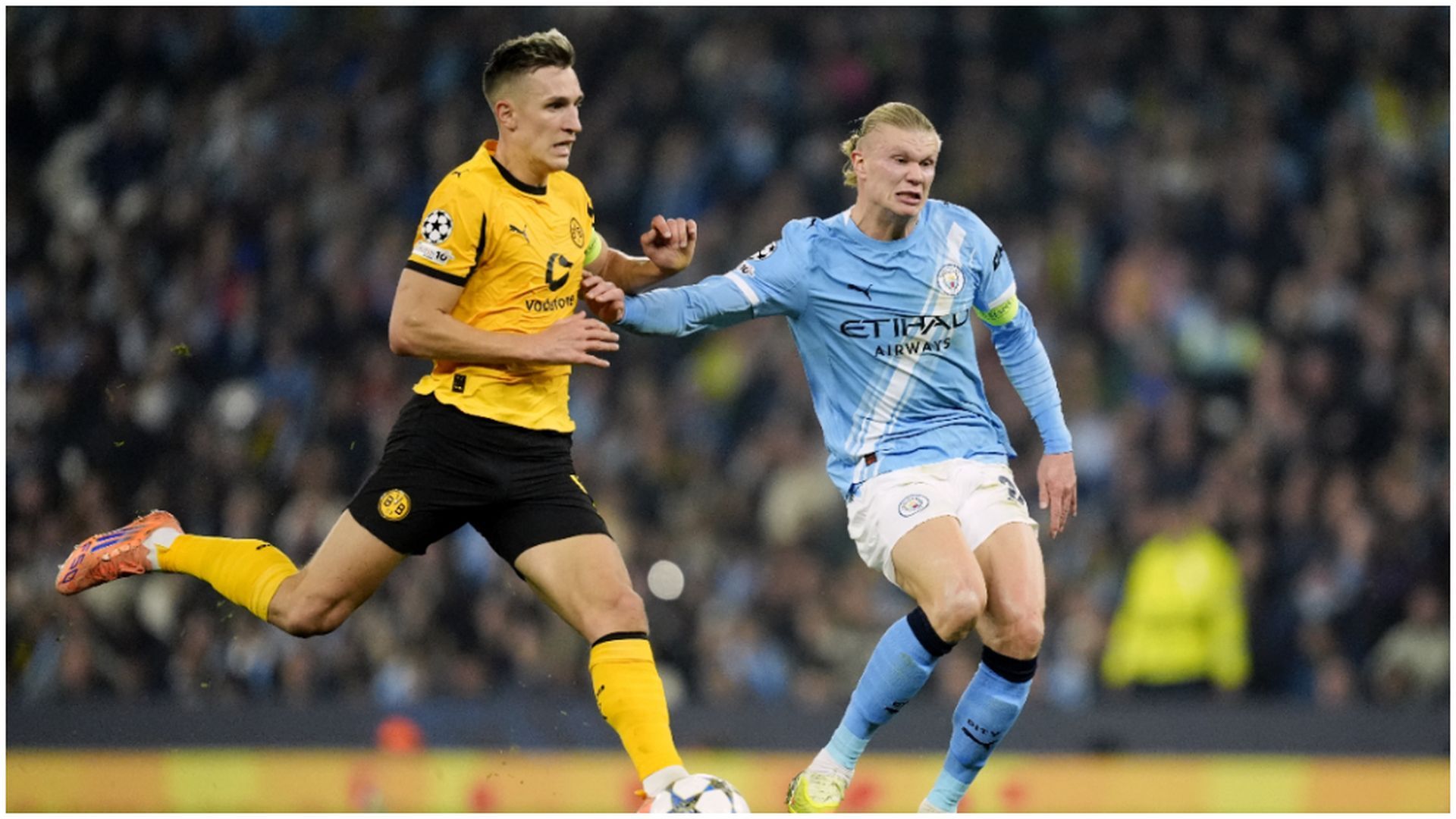 Nico Schlotterbeck y Erling Haaland