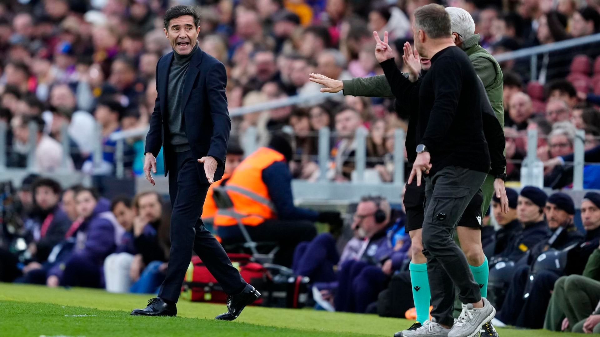 Hansi Flick y Marcelino discutiendo