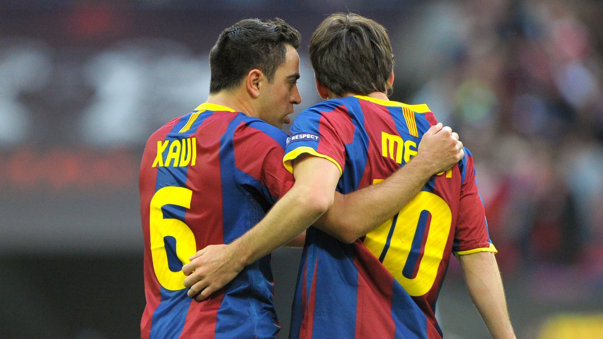 Xavi Hernández y Messi en un partido con el Barça