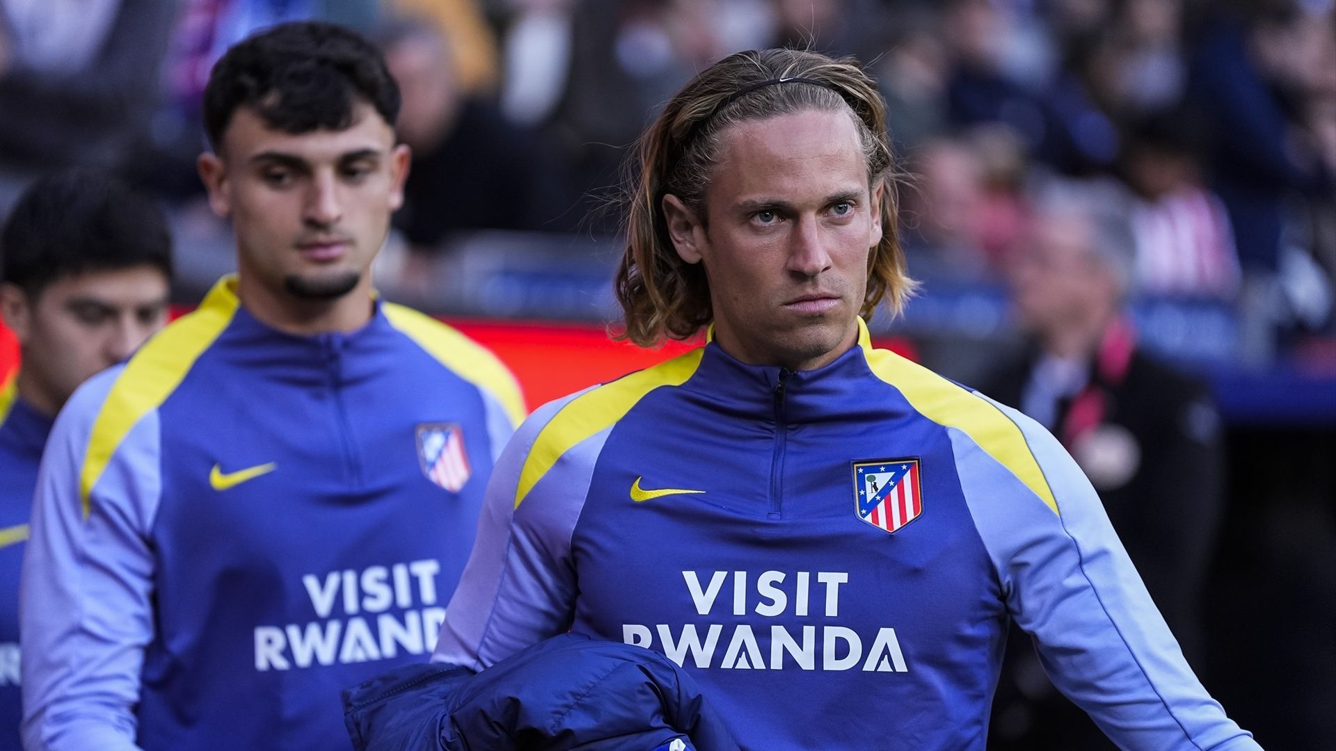 Marcos Llorente y Marc Pubill antes de un partido del Atlético de Madrid esta temporada