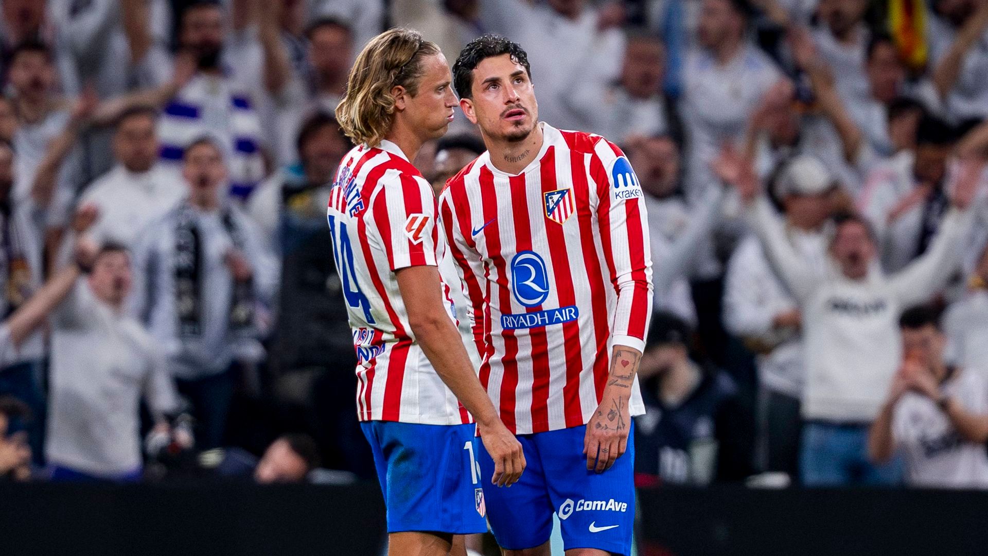 Giménez y Marcos Llorente en el derbi