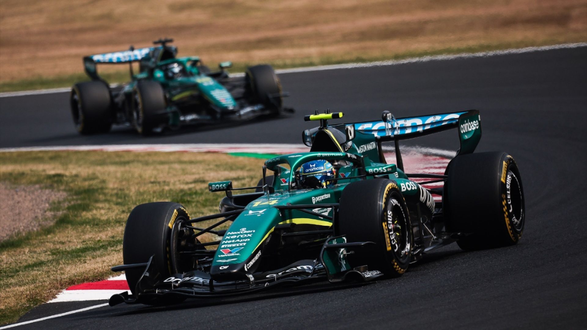 Fernando Alonso y Lance Stroll, en el GP de Japón