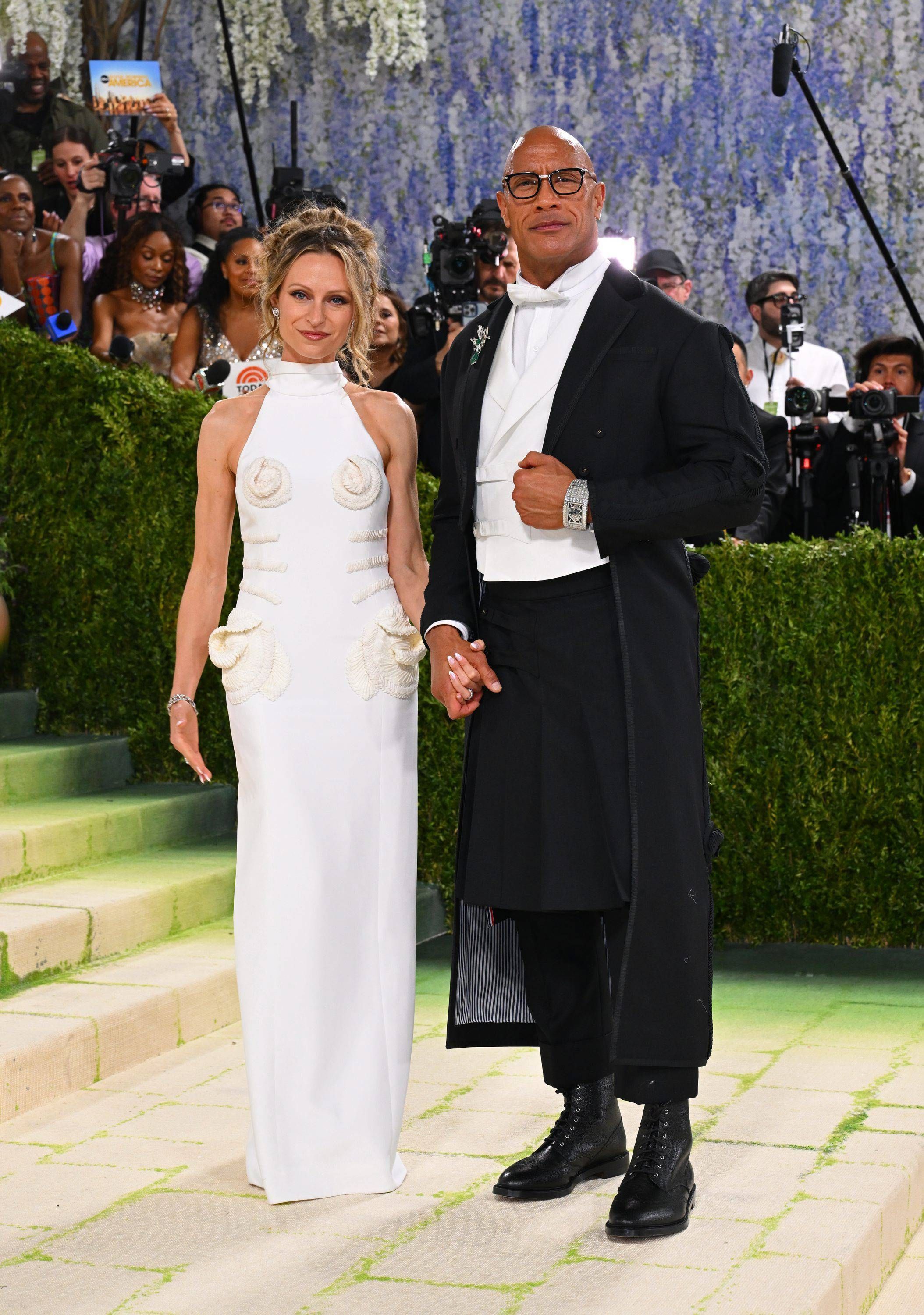 Lauren Hashian y Dwayne Johnson