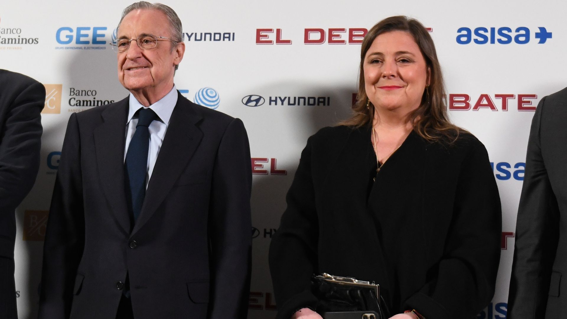 Florentino Pérez, acompañado por su hija Cuchy en un acto en 2023