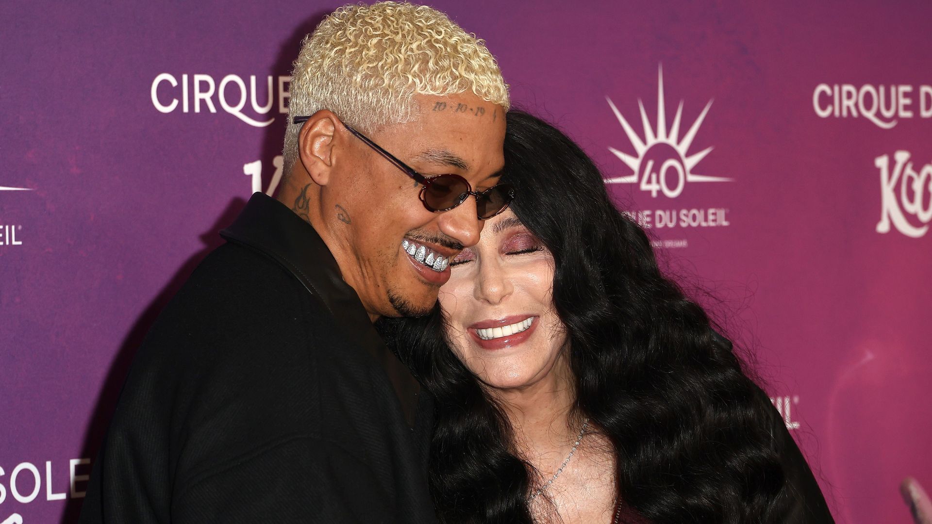 Alexander 'AE' Edwards y Cher