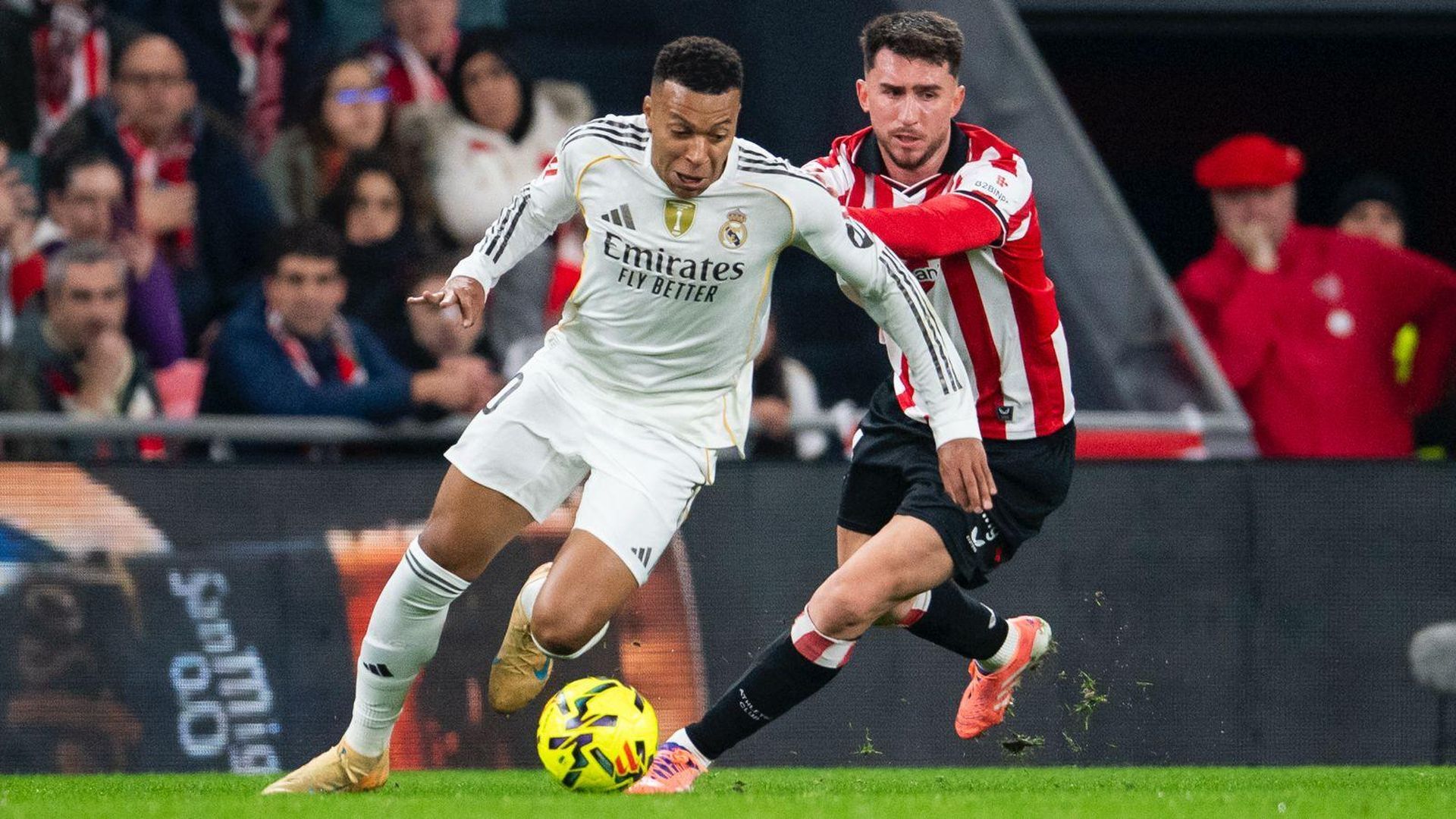 Kyian Mbappé y Aymeric Laporte en la primera vuelta en San Mamés