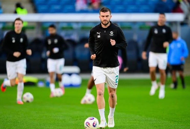 Tim Payne durante un calentamiento con Nueva Zelanda