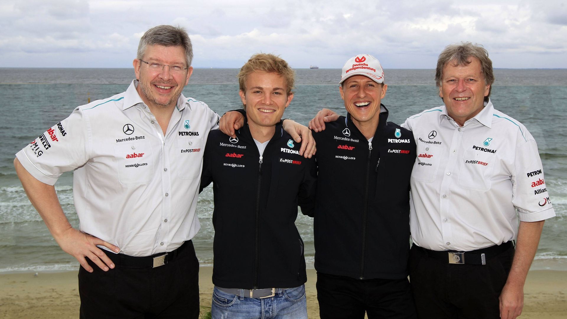 Ross Brawn, Nico Rosberg, Michael Schumacher y Norbert Haug en 2011