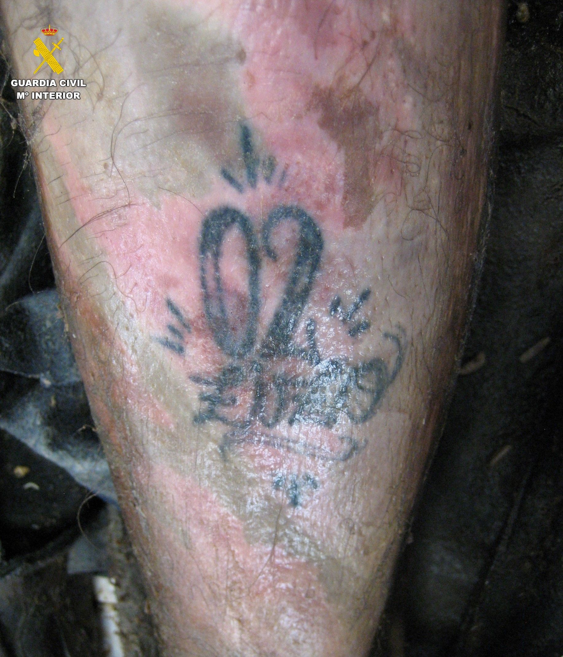 Tatuaje que llevaba en la pierna el fallecido
