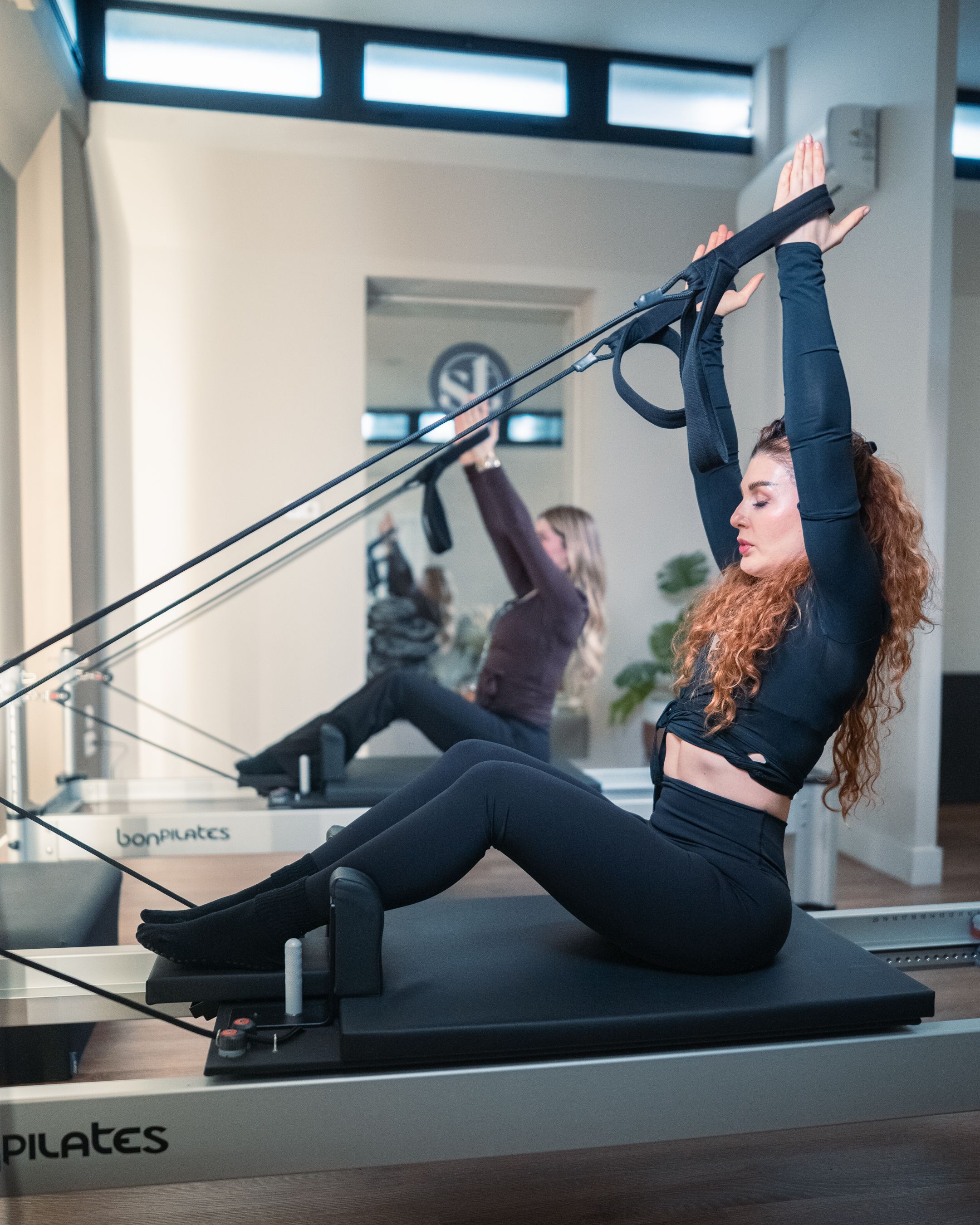 Flavia del Mastro, impartiendo una de sus clases de pilates reformer en Sistribe